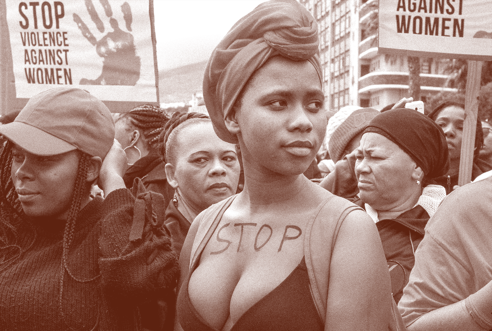 Protest photo of Women with 'STOP' written on chest