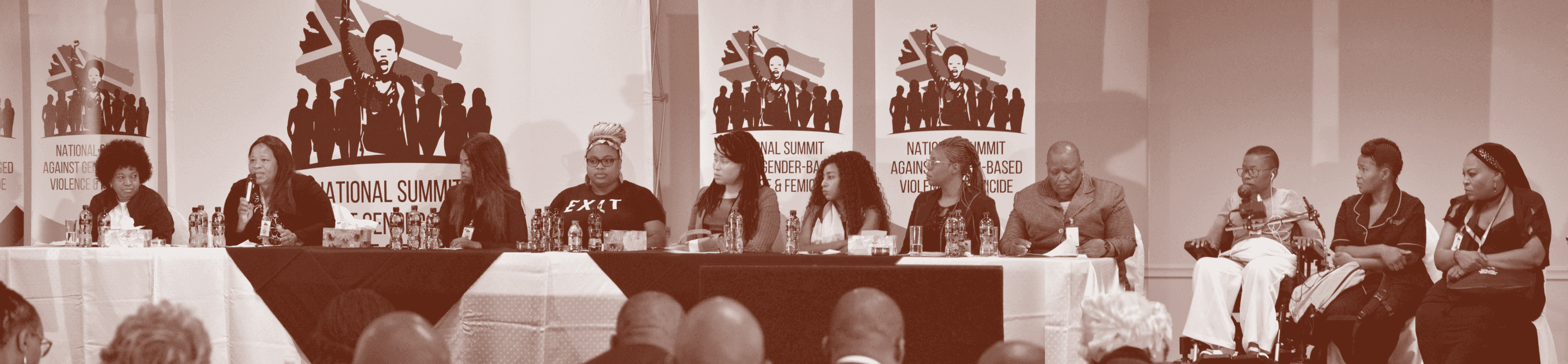 Long table discussion of people at National Summit Against...