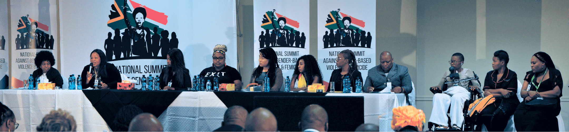 Long table discussion of people at National Summit Against...